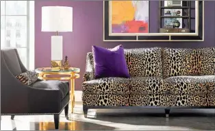  ?? Tribune News Service ?? The Drake sofa by Lillian August for Hickory White in a fun, bold leopard print.