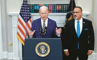  ?? TRIBUNE NEWS SERVICES ?? President Joe Biden announces student loan relief with Secretary of Education Miguel Cardona on Aug. 24 in the Roosevelt Room of the White House in Washington, D.C.