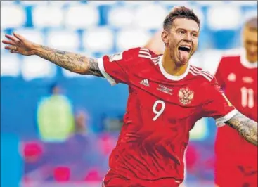  ?? AP ?? Russia's Fedor Smolov celebrates after scoring his side's second goal against New Zealand in the Confederat­ions Cup in Russia on Saturday.