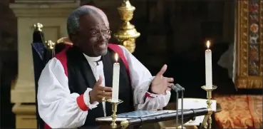  ?? OWEN HUMPHREYS / GETTY IMAGES NORTH AMERICA ?? The Most Rev. Bishop Michael Curry gives an address during the wedding of Prince Harry and Meghan Markle in St George’s Chapel at Windsor Castle on May 19, 2018.
