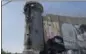  ?? NASSER NASSER — ASSOCIATED PRESS ?? A mural resembling the work of elusive artist Banksy depicts President Donald Trump kissing an Israeli army watchtower, part of Israel’s West Bank separation barrier in the West Bank city of Bethlehem, on Friday.