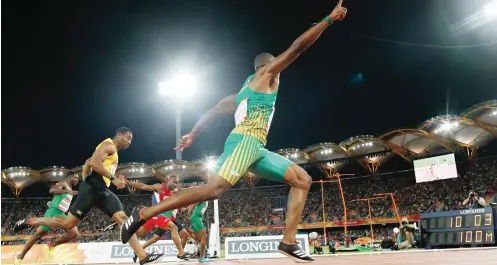  ?? Photo: AFP ?? South Africa’s Akani Simbine reacts as he wins the athletics men’s 100m final during the 2018 Gold Coast Commonweal­th Games at the Carrara Stadium yesterday