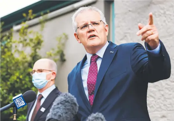  ?? Picture: NCA NewsWire ?? Prime Minister Scott Morrison at a press conference at Kirribilli House in Sydney, joined by chief medical officer Paul Kelly.