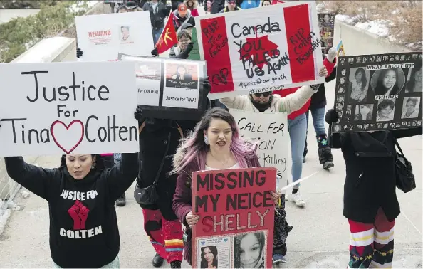  ?? SHAUGHN BUTTS ?? Jada Tootoosis, left, leads a few hundred people rallying Sunday at Churchill Square and the courthouse demanding justice for Colten Bouchie and Tina Fontaine. The two high profile trials involving the deaths of Aboriginal people did not produce...