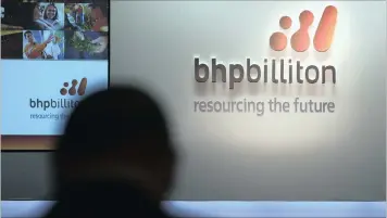  ??  ?? BHP Billiton joins Rio Tinto Group in expressing increased optimism on the outlook for commoditie­s amid continued strong demand in China, the top consumer.