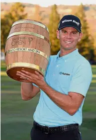  ?? — AFP ?? Happy man: Brendan Steele posing with the trophy after capturing the Safeway Open crown in Napa on Sunday.