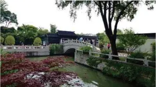  ??  ?? TOP: Suzhou is also known as “Venice of the Orient”.
LEFT: The Couple’s Retreat Garden is divided into the East, West and Middle sections.