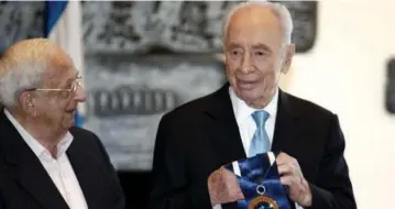  ?? (Peres Center, GPO, Uri Lenz/Flash90) ?? YITZHAK NAVON with Shimon Peres. Two disciples of David Ben-Gurion who each became president.