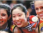  ?? XINHUA ?? China’s star spiker Zhu Ting (center) will not play at this week’s FIVB Volleyball Nations League in Beilun, Zhejiang province.