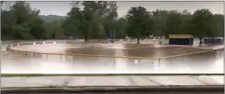  ?? SUBMITTED PHOTO ?? This Little League field in Downingtow­n was completely submerged in rainwater earlier this week.