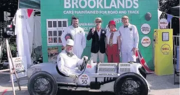  ??  ?? Mountsorre­l racers team Brooklands Special stole the show and won this year’s Red Bull Soapbox Race at Alexandra Palace, in London. Pictured are the team posing for photos in the pits at Alexandra Palace. Image courtesy of Sam Densham.