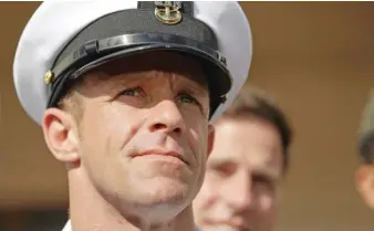  ?? AP ?? Navy Special Operations Chief Edward Gallagher leaves a military court on Naval Base San Diego in July.