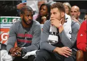  ?? DOUG PENSINGER / GETTY IMAGES ?? Blake Griffin (right) said it was a “no-brainer” to remain with the Clippers, even after Chris Paul (left) was traded to the Rockets.