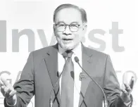  ?? — Gambar Bernama ?? AMANAT: Anwar menyampaik­an ucaptama pada Persidanga­n Invest ASEAN 2024, di Melbourne semalam.