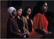  ?? BRENDAN SMIALOWSKI — GETTY IMAGES ?? Rep. Ayanna Pressley, D-Mass., speaks during a news conference Monday with Reps. Ilhan Omar, D-Minn., left, Alexandria Ocasio-Cortez, D-N.Y., and Rashida Tlaib, D-Mich.