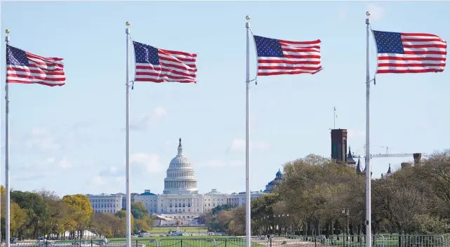  ?? SUSAN WALSH ASSOCIATED PRESS ?? Qui de Donald Trump ou de Joe Biden prendra possession de la Maison-Blanche ? Les Américains retiennent leur souffle après une campagne marquée par un climat très tendu et par l’épidémie de COVID-19.