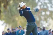  ?? AP PHOTO/RYAN KANG ?? Keith Mitchell hits from the ninth tee at Riviera Country Club on Sunday during the final round of the PGA Tour’s Genesis Invitation­al in Los Angeles. Mitchell, a Baylor School graduate, finished fifth.