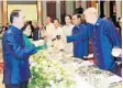  ?? STR/AFP ?? Vietnam President Tran Dai Quang, left, and President Trump toast each other in Danang on Friday.