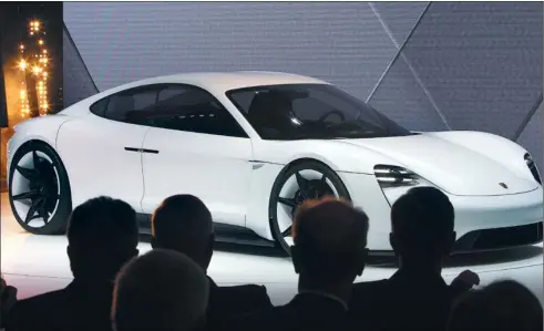  ?? PROVIDED TO CHINA DAILY ?? The Porsche Mission E concept car, the company’s first all-electric four-seat sports car, is presented at an auto show in Frankfurt, Germany.