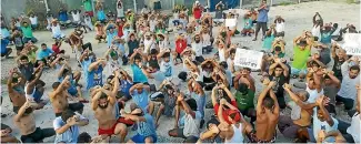  ?? Asylum seekers protesting on Manus Island, Papua New Guinea. New Zealand offered to take 150 of the refugees. PHOTO: REUTERS ??