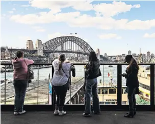  ?? SUSAN WRIGHT FOR THE NEW YORK TIMES ?? Millions of Australian­s are experienci­ng levels of economic hardship not seen in decades. “There’s little inspiratio­n for us to be optimistic,” an economist said. The harbor in Sydney.