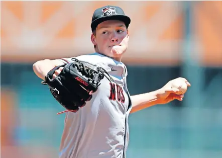  ?? [SARAH PHIPPS/ THE OKLAHOMAN] ?? Mustang's Daxton Fulton throws a pitch during the Class 6A state baseball championsh­ip game in 2017 against Westmoore. Fulton is expected to be picked in the MLB Draft on June 10-11.