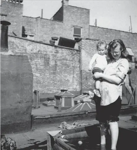  ?? Laurence Jackson Hyman ?? SHIRLEY JACKSON, shown with son Laurence circa 1944 in the Greenwich Village, crafted macabre, terrifying and comic tales.