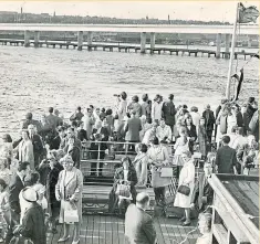  ?? Picture: DC Thomson. ?? The last ever Tay ferry crossings took place in the shadow of the new road bridge.