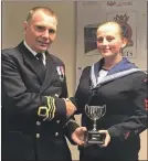  ?? IF F23 Sea Cadet Awards Deeann Strachan01 ?? Deeann Strachan accepted the divisional trophy on behalf of Dragon division from District Officer Robbie Hay.