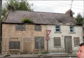  ??  ?? Derelict houses at Bride Street in Wexford.