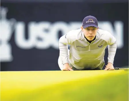  ?? JULIO CORTEZ AP ?? U.S. Open winner Matt Fitzpatric­k lines up a putt on sixth hole during the final round of the U.S. Open on Sunday at The Country Club.