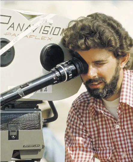  ?? POSTMEDIA FILES ?? Star Wars director George Lucas intentiona­lly broke with the “shiny and sleek” sci-fi films of the past, opting for a “scuffed and dirty” look for his iconic film, author A.D. Jameson says.