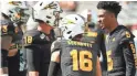  ??  ?? Arizona State quarterbac­k Joey Yellen (18) talks with quarterbac­k Jayden Daniels (5) before a game against USC on Nov. 9 in Tempe.