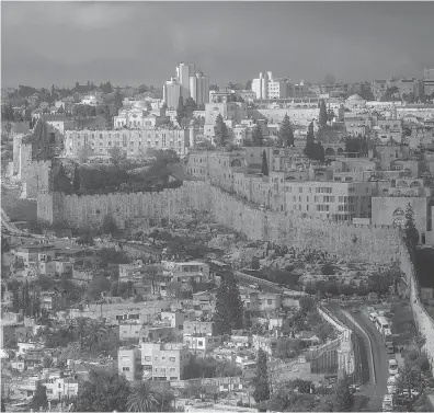  ?? CHRIS MCGRATH / GETTY IMAGES FILES ?? The Old City is seen from the Mount of Olives in Jerusalem, Israel. In the long history of Jerusalem, there have been times where the dominant power has made ample space for other religious believers, Fr. Raymond de Souza writes.