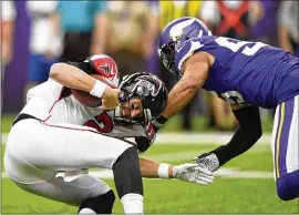  ?? GETTY IMAGES ?? Vikings outside linebacker Anthony Barr sacked the Falcons’ Matt Ryan on the first play from scrimmage last Sunday. Ryan was sacked four times in the 28-12 loss.