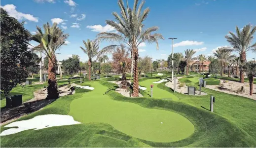  ?? ROB SCHUMACHER/THE REPUBLIC ?? Popstroke Glendale features two 18-hole putting courses. Popstroke is created by Tiger Woods and his TGR Design team featuring a full-service open-air restaurant, an outdoor game area, a playground and an ice cream parlor at Westgate Entertainm­ent District.