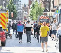  ??  ?? Shop local Shoppers on Perth High Street this week are helping the local economy to recover