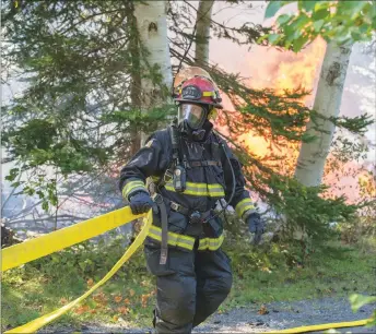  ?? FILE PHOTO ?? Firefighte­rs responded to this fire in Pictou which spread to surroundin­g brush.