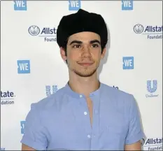  ?? (PHOTO BY RICHARD SHOTWELL/INVISION/AP ?? In this April 25, file photo, Cameron Boyce arrives at WE Day California at The Forum in Inglewood.