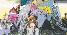  ?? Picture: BRENDAN RADKE ?? TRIBUTES: Flowers, teddy bears and trinkets have been laid at Shang Park where a 1- year-old boy died.