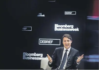  ?? CP PHOTO ?? Prime Minister Justin Trudeau is interviewe­d by Bloomberg Editor-in-Chief John Micklethwa­it in Toronto on Thursday.