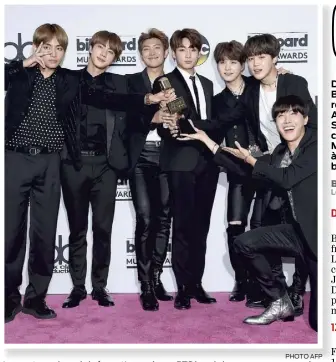  ??  ?? PHOTO AFP Les sept membres de la formation coréenne BTS lors de leur passage remarqué aux prix Billboard.