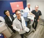  ?? JOE BURBANK/ORLANDO SENTINEL ?? From left, Drs. Illena Antonetti, Adam Waldman, Arnold Einhorn, and Mark Steiner at the new Cardiovasc­ular Center of Florida, located near the Orlando Health campus, on Thursday.