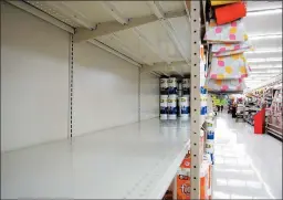  ?? LINDSEY SHUEY/THE REPUBLICAN-HERALD ?? Shelves for paper goods sit empty Nov. 2 at Redner’s in Schuylkill Haven, Pennsylvan­ia.