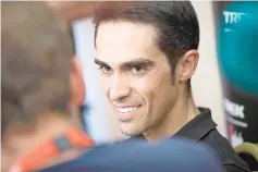  ?? — AFP photo ?? Trek-Segafredo team’s Spanish cyclist Alberto Contador smiles during a press conference on August 18, 2017 in Nimes, southern France.