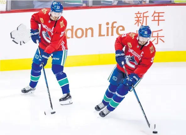  ?? — THE CANADIAN PRESS FILES ?? The future of the Canucks’ Daniel Sedin, left, and his twin brother, Henrik, remains up in the air but they have shown they can still play and would be welcome back in a Vancouver uniform for at least one more season if that’s what they want.