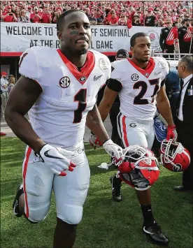  ?? CURTIS COMPTON / CCOMPTON@AJC.COM ?? Georgia’s Sony Michel (left) and Nick Chubb combined to rush for 326 yards and five touchdowns in the Rose Bowl on Monday.