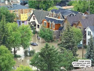 ?? AFP ?? Large areas of Calgary are stillunder water.