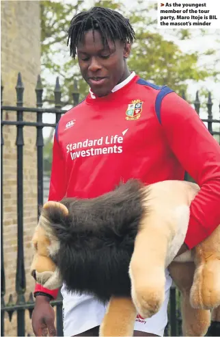  ??  ?? > As the youngest member of the tour party, Maro Itoje is BIL the mascot’s minder