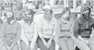  ??  ?? Students of the Ayotzinapa school protest at the tollbooths of the Mexico-Acapulco highway in Chipalcing­o, Guerrero state, Mexico. — AFP photo